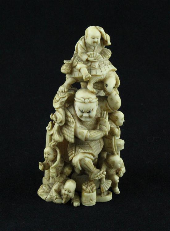 A Meiji period ivory netsuke carved as Shoki