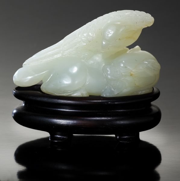 Chinese Qing carved jade toggledepicting 173be6