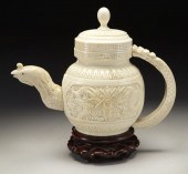 Chinese carved ivory teapot depicting