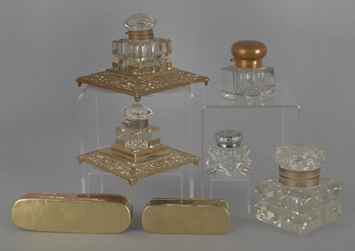 Five brass and cut glass inkwells 176902