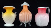 QUILTED SATIN GLASS VASE. Bearing a