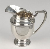 FISHER STERLING SILVER WATER PITCHER.
