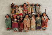 Fourteen Native American Skookum dolls