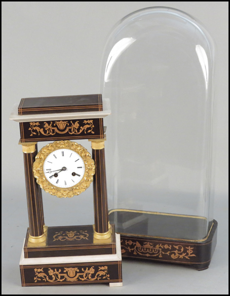 FRENCH PORTICO CLOCK. Bearing marquetry inlay