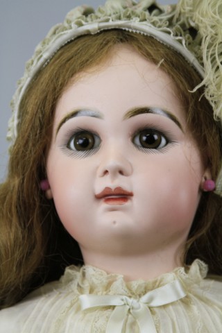 LARGE TETE JUMEAU BEBE Wide eyed doll with