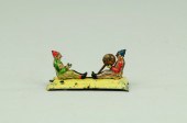 CLOWNS TOSSING BALL PENNY TOY Germany 17a0b0