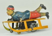 BOY ON SLED TOY Germany Hess lithographed