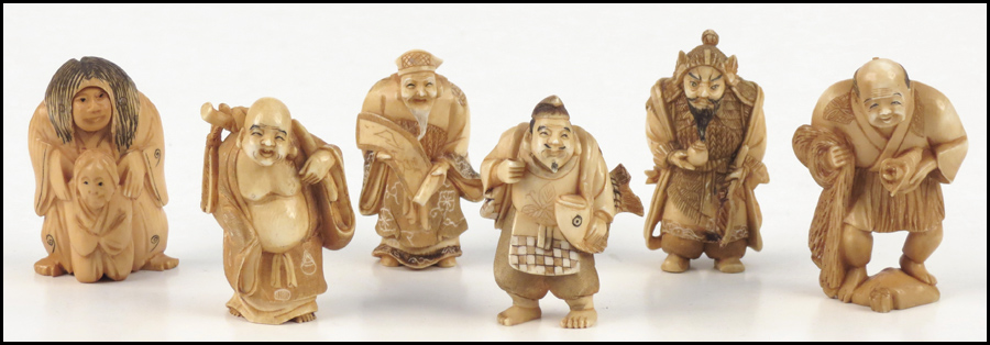 COLLECTION OF CARVED IVORY FIGURES.