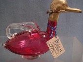 Cranberry glass duck cruet, clear glass