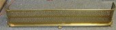 Pierced brass fireplace fender, 57