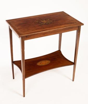 An Edwardian mahogany inlaid table 279785