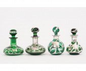 Four silver overlay green glass perfume