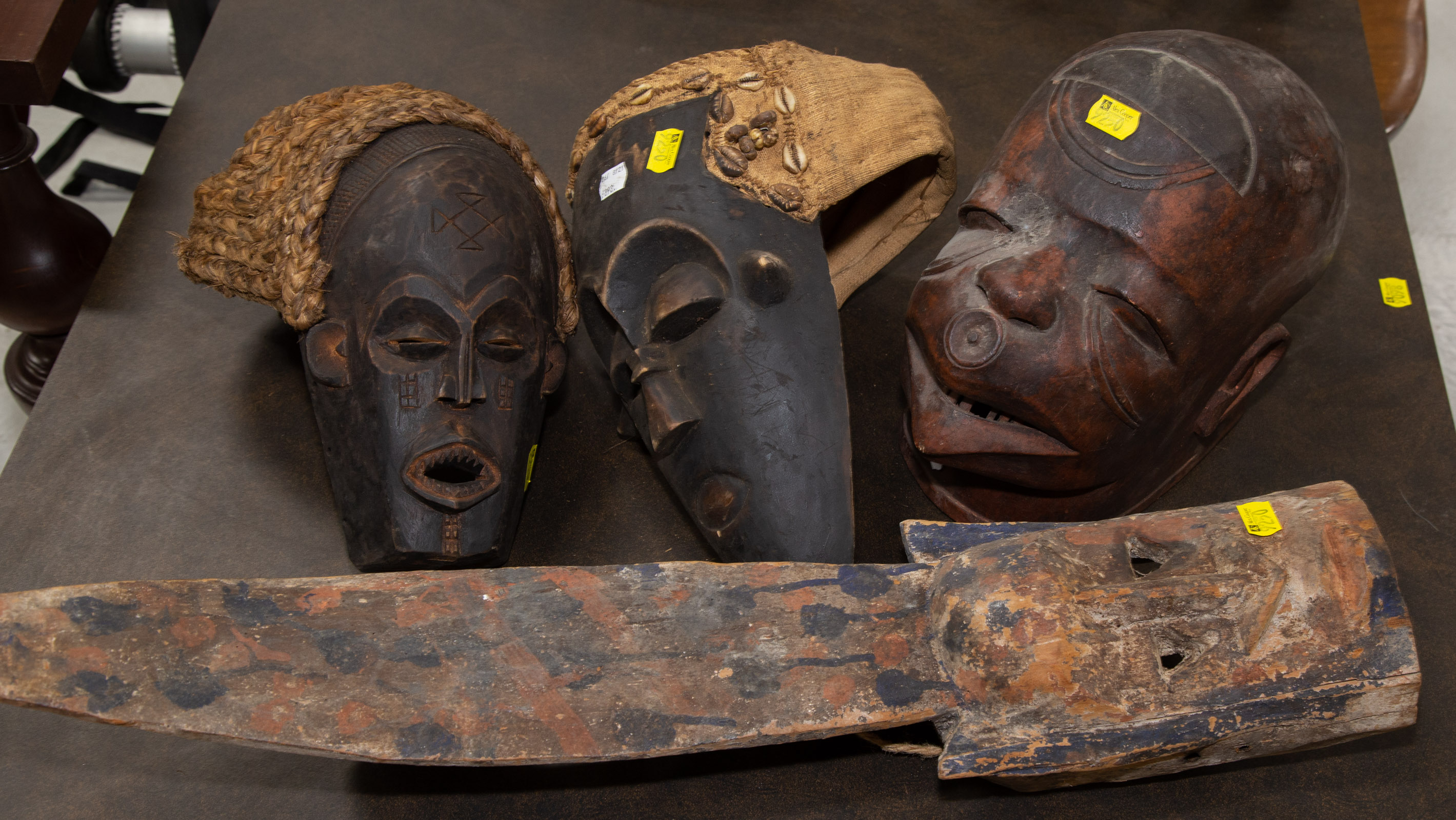 FOUR AFRICAN CARVED WOOD MASKS 28825a