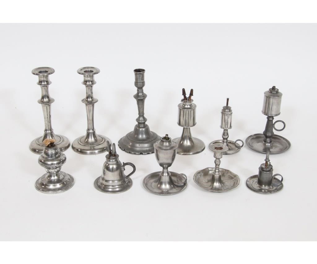 Eleven pieces of pewter lighting  28a6e8