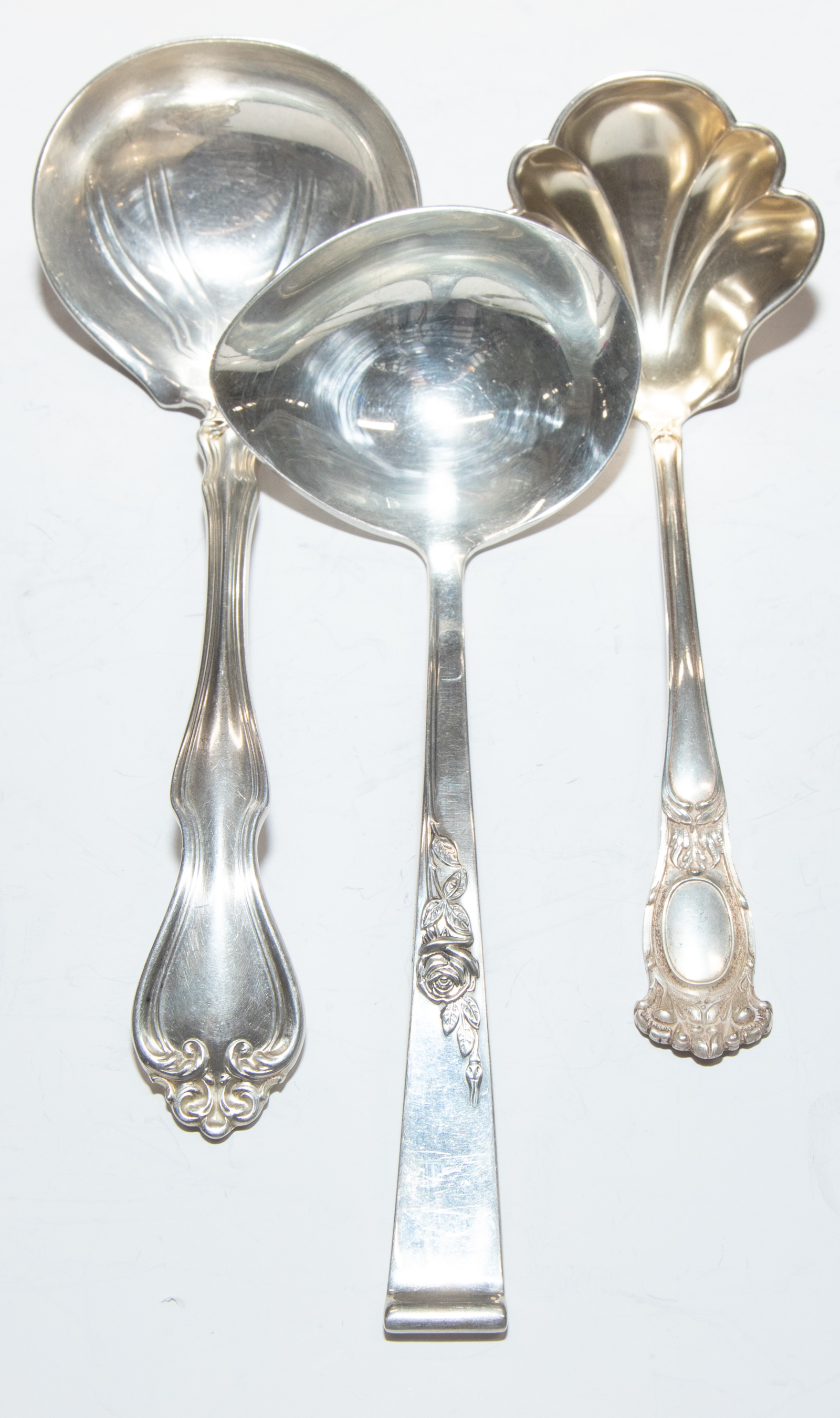THREE STERLING SAUCE LADLES Including 289759