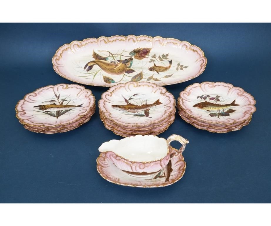 Ten Limoges fish plates together 28a1dd