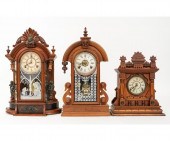 Three walnut mantel clocks, two by Wm.