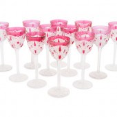 A Set of Twelve Baccarat Cranberry Cut-to-Clear