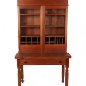 A Late Federal Cherrywood Desk and Bookcase
Circa