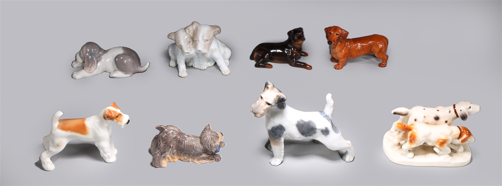 Group of 8 porcelain dog figures  2aaafc