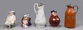 Group of five antique decorative pitchers;