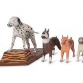 Four Folk Art Painted Wood Dog Figures
American,