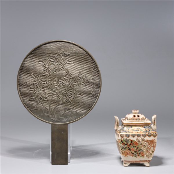 Japanese bronze mirror with molded