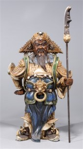 Chinese porcelain deity statue with