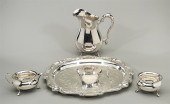 Four silver plate service items; including