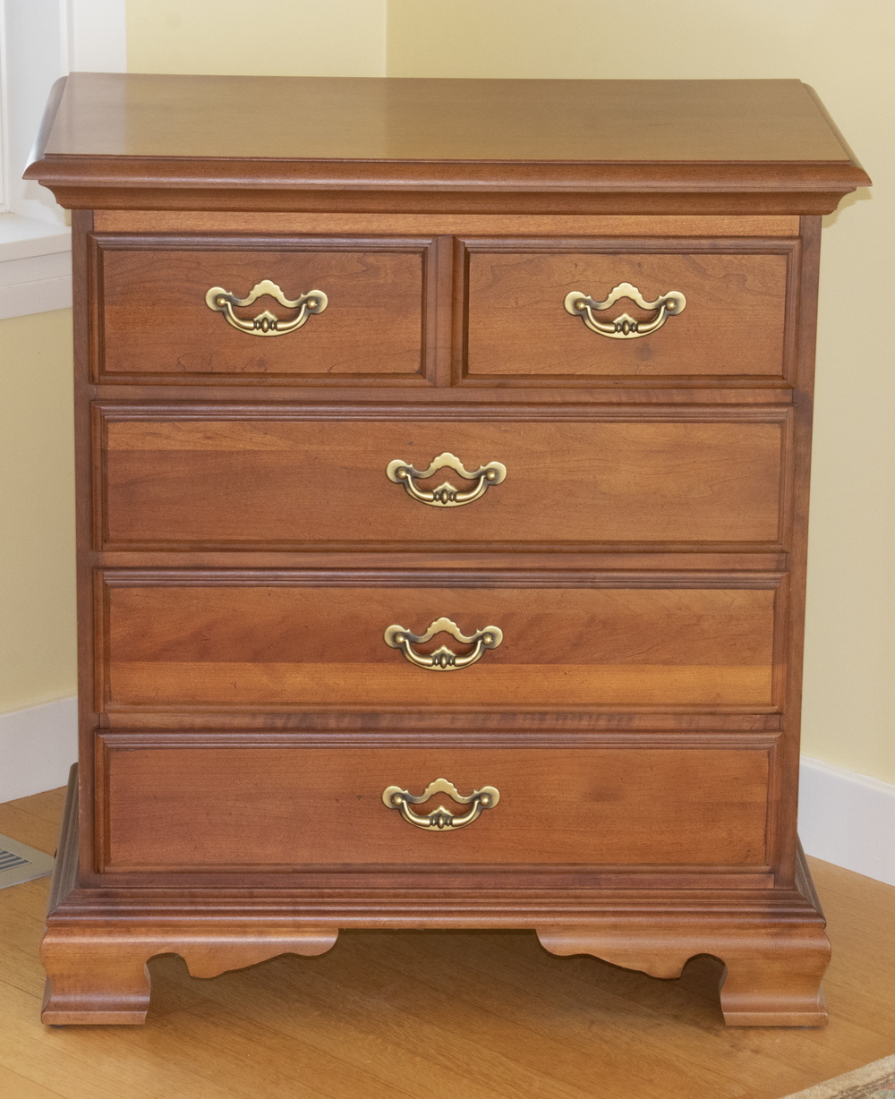 SMALL FOUR DRAWER DRESSER A small