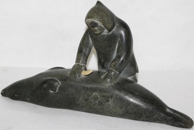 INUIT STONE CARVING DEPICTING A 2c1a58