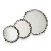 A GROUP OF THREE SALVERS AND TRAYS Harrison