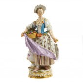 A MEISSEN FIGURE OF A LADY WITH BASKET