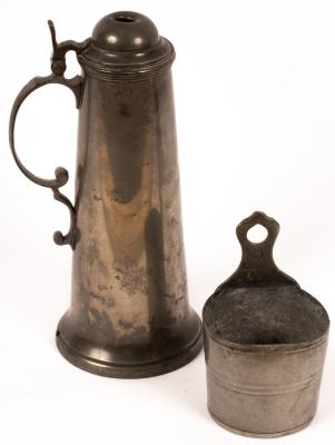 A pewter flagon with scrolled handle 2db1a3