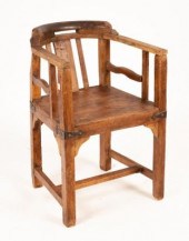 A rustic elm chair of tub shape, metal