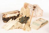 A 19th Century wax doll, a box of dolls