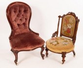 A Victorian walnut chair with deep button
