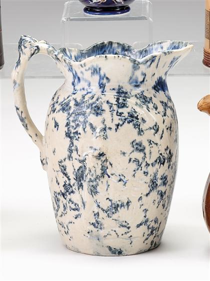    	Molded spatterware stoneware pitcher	