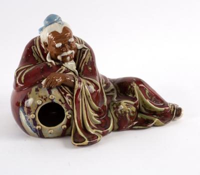 A Chinese pottery figure by Liu 2de6bc