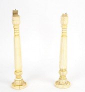 A pair of Anglo-Indian ivory candlesticks