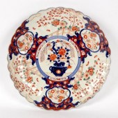 A Japanese Imari charger with scalloped