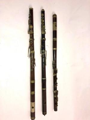 A rosewood flute with another very