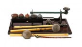 Four Chinese opium pipes, eight dampers,