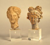 Two Roman terra cotta statuary fragments