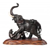 Chinese bronze elephant and tiger figure