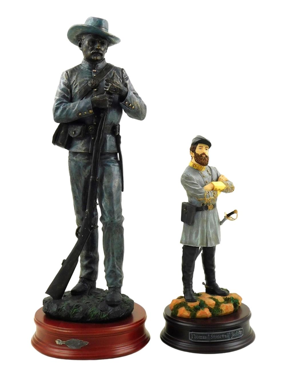 TWO RESIN COMMEMORATIVE FIGURES 2e2ab1