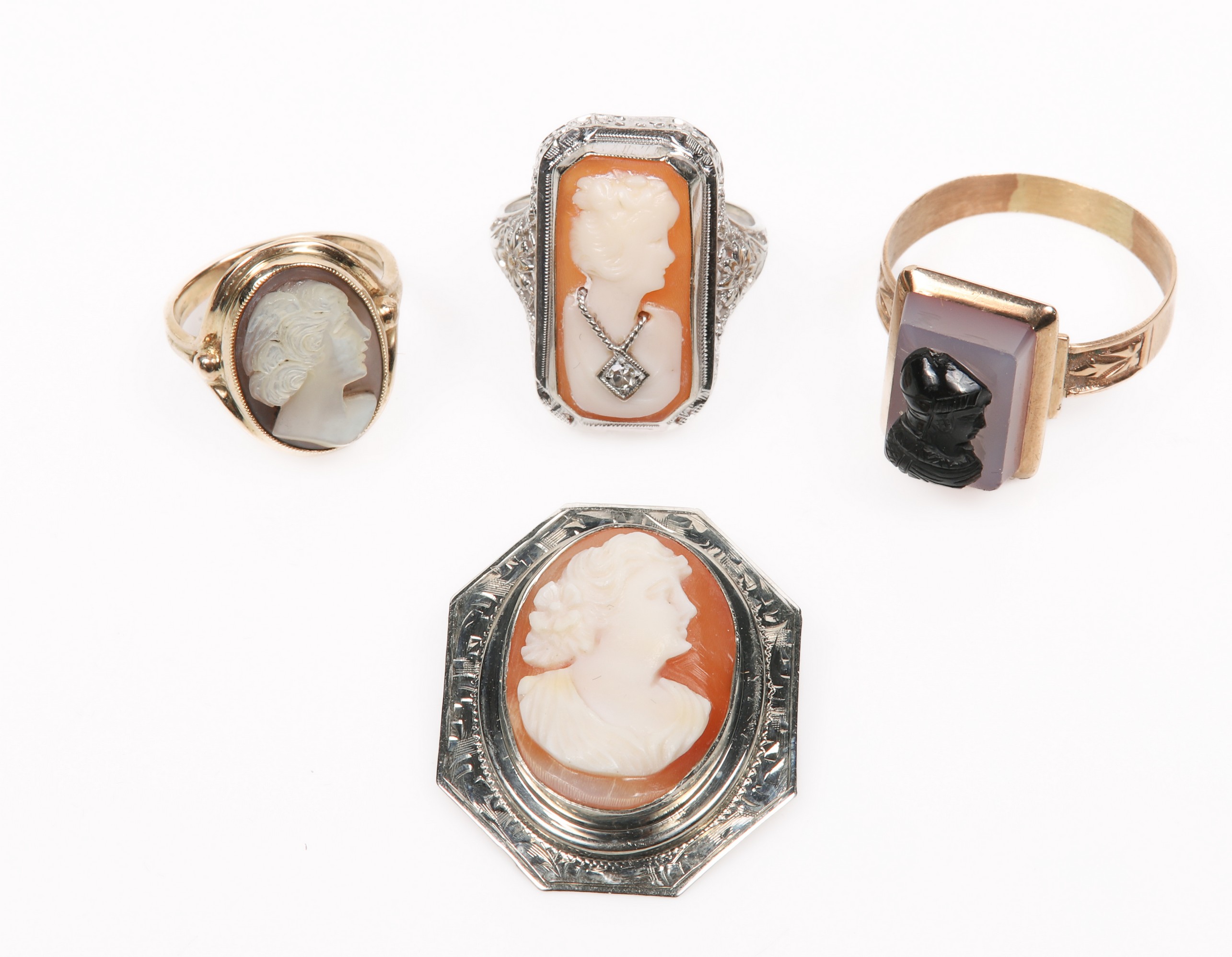  4 Cameo rings and brooch to include 2e16f2