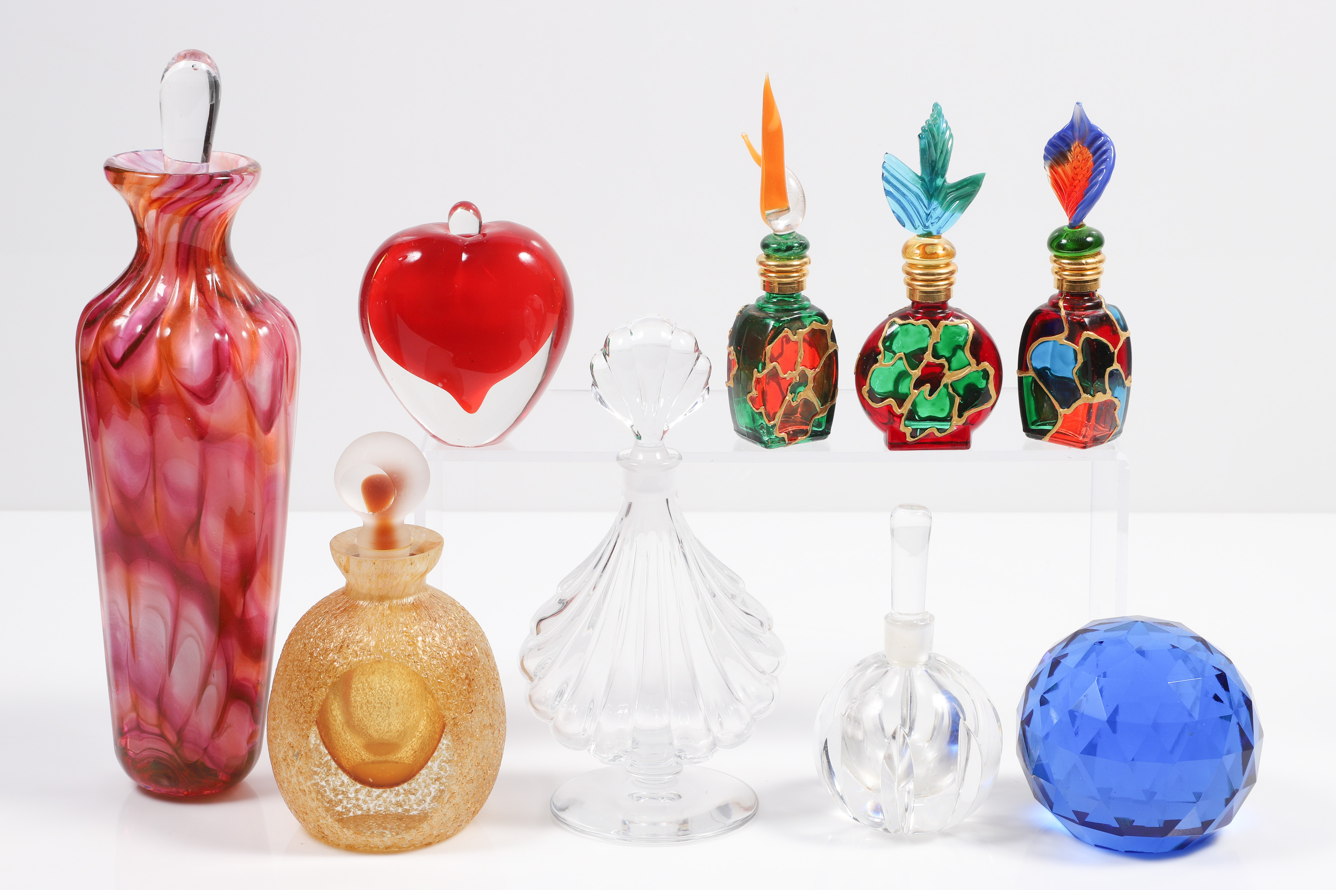  8 Glass scent bottles and weight 2e1916