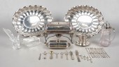 Silverplate, sterling and glass table