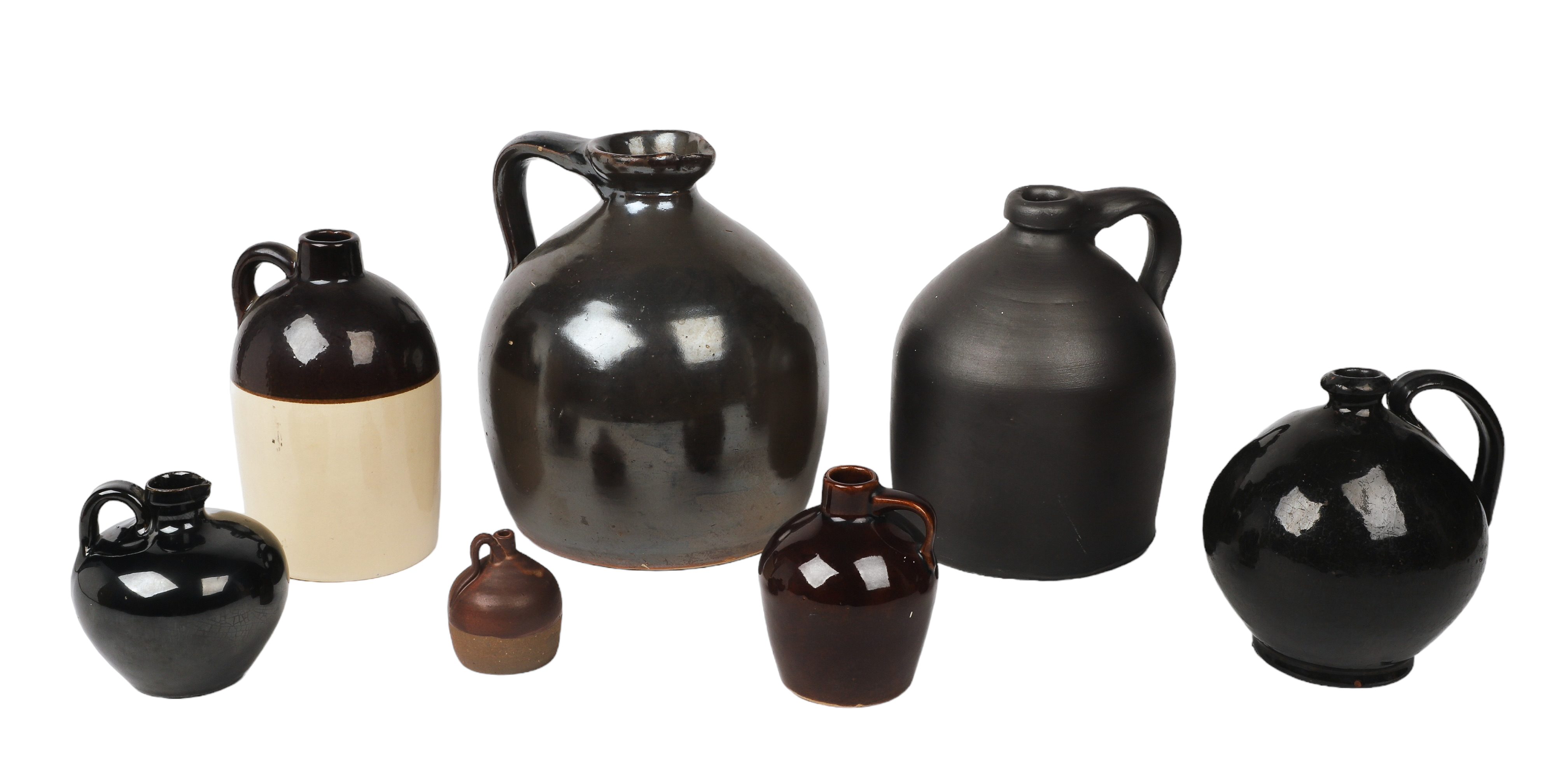  7 Stoneware jugs to include a 2e23a3